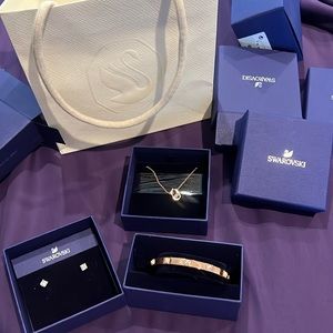 Set of earrings (missing backs) necklace and bracelet from Swarovski! Very nice